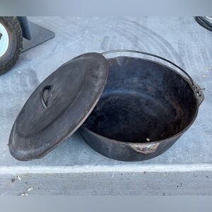 Vintage Black Cast Iron Dutch Oven with Lid and Bail Handle